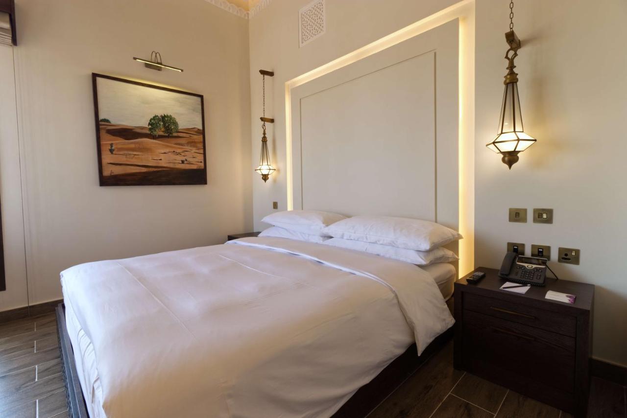 Al Badayer Retreat By Sharjah Collection Hotel Margham ภายนอก รูปภาพ A bedroom at the hotel